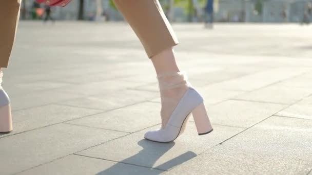 Legs walk city tracking stylish woman feet white — Stock Video