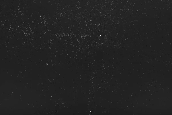 Bílý prach škrábance černé ztrápený pozadí — Stock fotografie