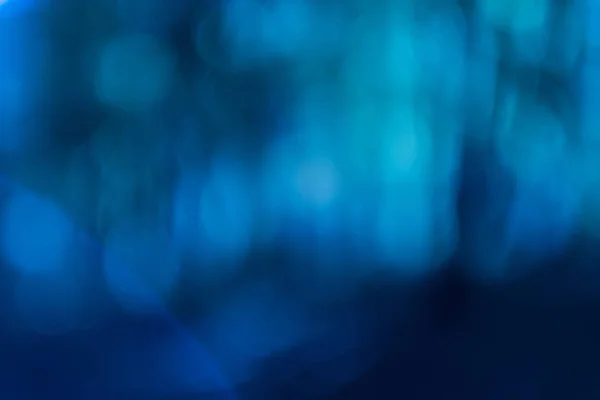 Blue bokeh lights defocused gleam background — Stock Photo, Image