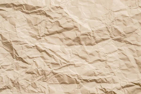 Prázdný béžový zmačkaný papír v pozadí — Stock fotografie