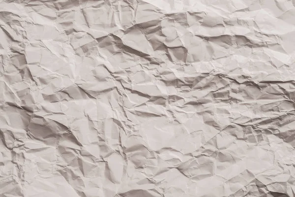 Beige gerimpeld papierafval recycling achtergrond — Stockfoto