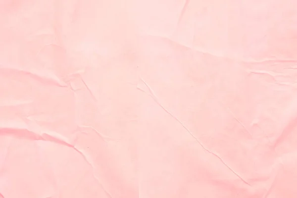 Coral pink wet paper wrinkled texture background — стоковое фото