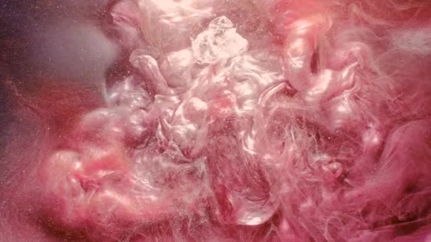 Inktstroom parel Pools roze glitter vloeistof verf — Stockvideo