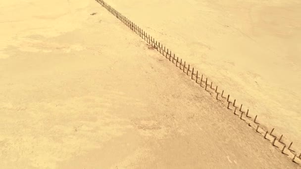 Desert landscape yellow sand abandoned bridge — Stock Video