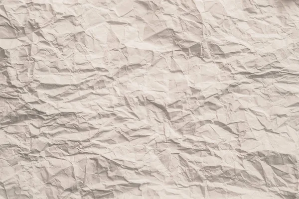 Resíduos de papel enrugado bege em branco reutilização de fundo — Fotografia de Stock