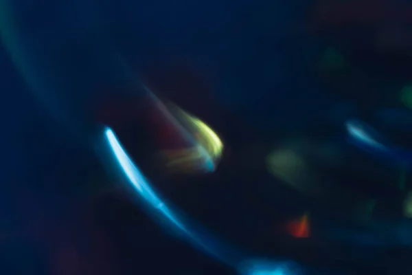 Blue bokeh lights blur glowing lines lens flare — Stock Photo, Image