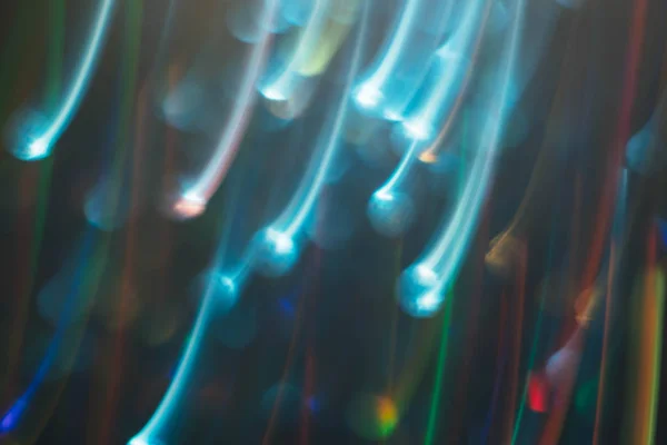Neon çok renkli parlayan çizgiler mavi kıvılcım düşen — Stok fotoğraf