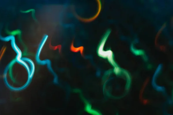 Neon aqua blue lights blur glowing swirly lines — Stock Photo, Image