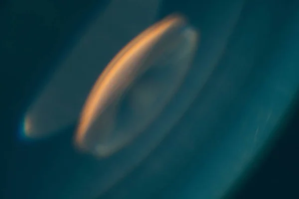 Lueur déconcentrée sarcelle bleu fond lentille fusée éclairante — Photo