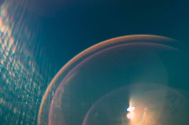 lens flare mavi arka plan gökkuşağı daireler