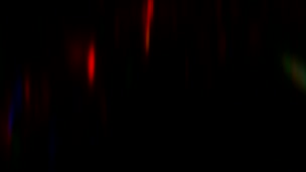 Flecks lumineux flou irisé mouvement éblouissement noir — Video