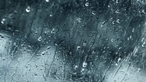 Chuva gotas movimento água cinza fundo de vidro — Vídeo de Stock