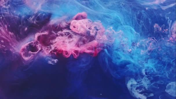 Color vapor fondo rosa azul pintura mezclar agua — Vídeo de stock