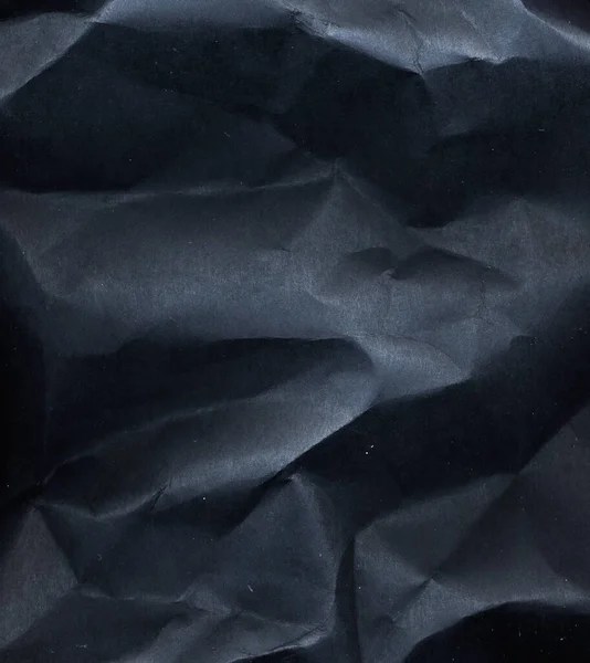 黒い紙の背景のしわのあるテクスチャグランジ — ストック写真