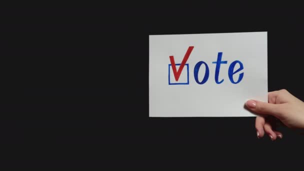 Знак голосування виборчий обов'язок рука агітує чек знак — стокове відео
