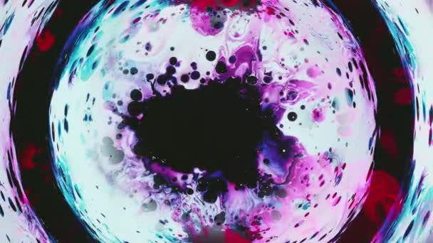 色彩艳丽的油墨涡流飞溅在框架运动的周围 — 图库视频影像