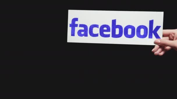 Facebook logo wereldwijde communicatie hand website — Stockvideo