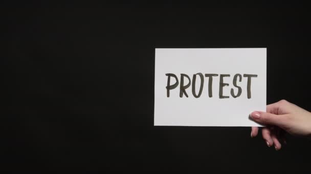 Protest sign black lives matter white hand message — Stok Video