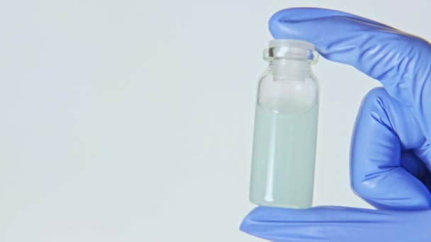 Lek próbka farmaceutyczny test ręka roztwór — Wideo stockowe