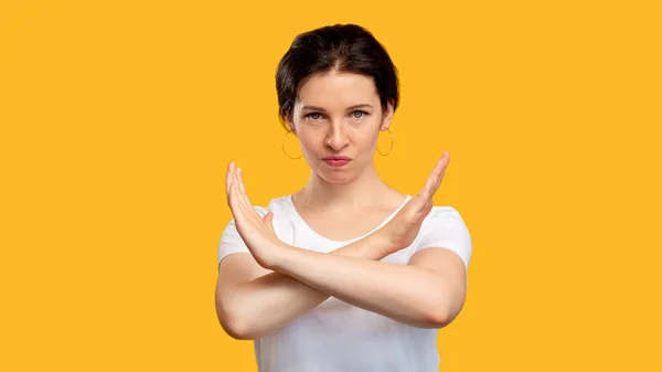 Stop sign forbidden gesture angry woman hands — Stock Photo, Image