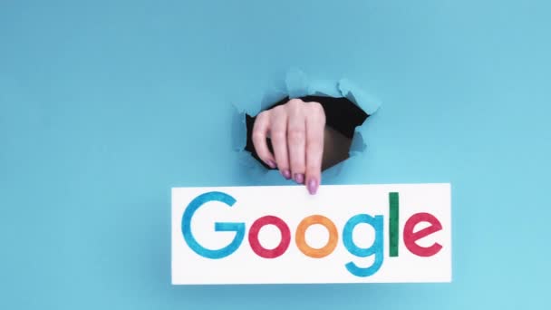 Google logo web search engine hand breakthrough — Stock Video