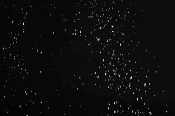Neve sfondo sfocatura caduta fiocchi bianchi nero — Foto Stock