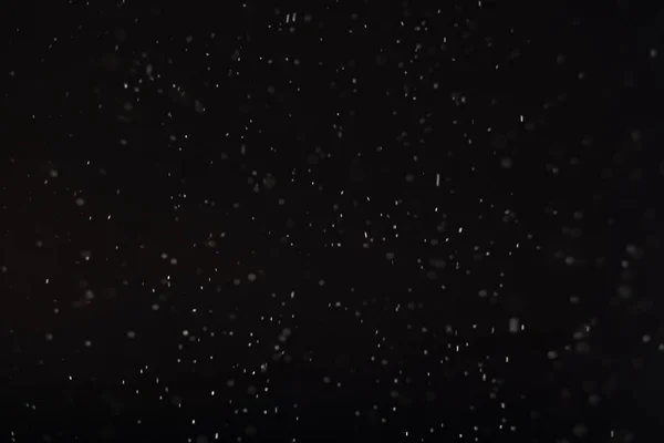 Темно-зимний фон размыт белый снежинки черный — стоковое фото
