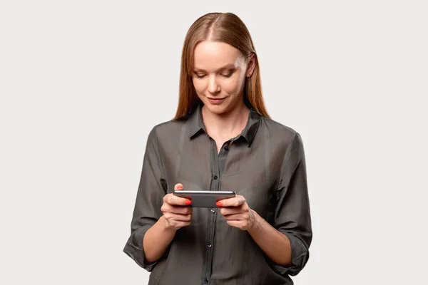 Online entertainment mobile app female user phone — Stock Photo, Image