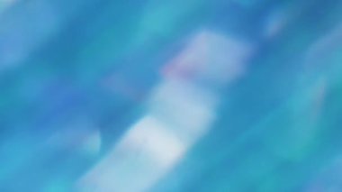 Parıltı sızıntısı. Odaklanamayan ışık. Pırıl pırıl parlayan mercek, bulanık sarı, mor, kırmızı, kaleydoskop sanat soyut arka planda hareket ediyor..