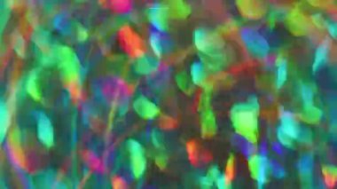 Flaş mercek fişeği. Odaklanmamış ruhani parıltı. Bokeh ışığını açan renkli parıldayan kaleydoskop titreşimi soyut arkaplanı bulanıklaştırdı.