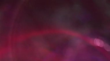 Bulanık ışık dokusu. Parlak efekt. Pırıl pırıl, kırmızı, mavi, mor, flaşlı, soyut, aydınlık, koyu renk arkaplan..