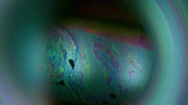 Odaklanamayan galaksi topu. Boya dökülmüş. Renk sıvısı parlayan küre. Kozmik dünya benzini Cyan soyut çerçeve arkaplanı.