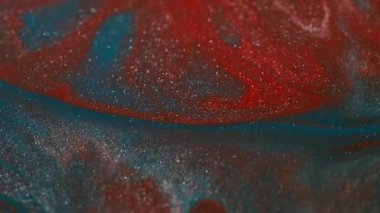 Işıldayan su sıçraması. Parıltılı boya döküldü. Odaklanmamış mavi renk parlak damlalar desen sıvı karışım akışı soyut sanat arkaplanı.