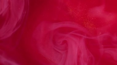 Parlak sis. Boya buharı. Odaklanmamış kırmızı pembe renk parçacıkları soyut sanat arka planında yüzen sisli su akrilik akım dumanı.