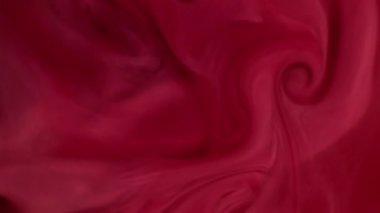 Duman parçacıkları. Boya karışımı. Odaklanmamış kırmızı kırmızı su dokusu kimyasal sis akrilik sıvı soyut sanat arka planına yayılıyor.