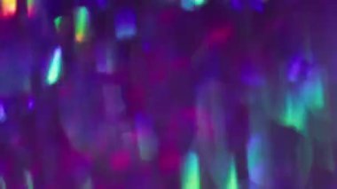 Parlak renk. Bulanık ışık. Bokeh etkisi soyut arkaplan ile dönen çok renkli doku parçacıkları mercek parlamaları.