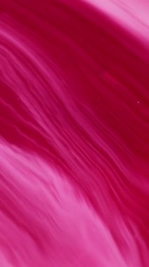 Dikey video. Akrilik karışımı. Boya damlası. Soyut arkaplanda yüzen pembe, beyaz, nemli, ışıl ışıl parçacıklar özü emülsiyon dalgası..