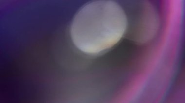 Neon ışıkları. Odaklanamayan parlak daireler. Bokeh efekti soyut arkaplan ile bulanık üzerinde dönen parlak kaleydoskop..