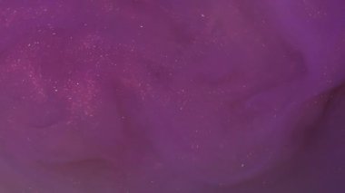 Parıltılı boya. Parlak sıvı. Soyut yaratıcı akrilik neon sanat arka planında sönük mor renkli parıldayan doku.