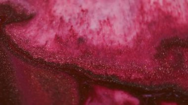 Parıltı dalgası. Köpüklü sıvı. Odaklanmamış pembe, pırıl pırıl parlayan desen çarpıcı, soyut sanat arkaplanı.