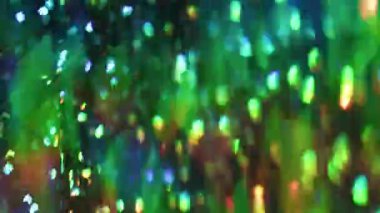 Parlak ışık. Bulanık parlak ışınlar. Parıldayan parçacıklar mercek parlamaları, bokeh efektli modern soyut sanat üzerinde hareket ediyorlar..
