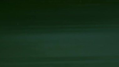 Ekran hasarı giderildi. Eski bir film fişeği. Sinematografik vintage bozulma kamera efekti örtüşüyor. Soyut Blink Gri arkaplan.