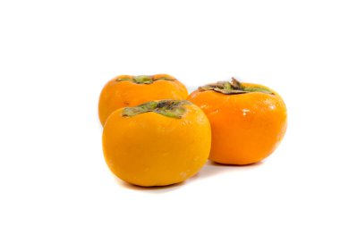 beyaz zemin üzerine Trabzon hurması