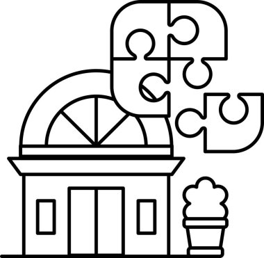 A house with a puzzle on it. The puzzle is made up of pieces that are scattered around the house