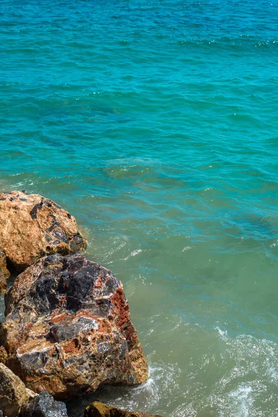 Deep blue stormy sea water surface with white foam and waves pattern. Aegean Sea