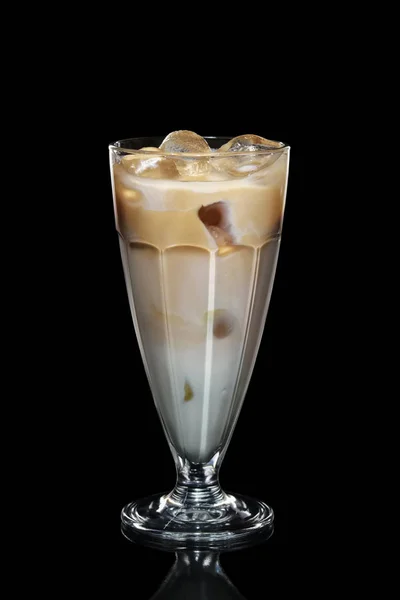 Cream and coffee ice cocktail isolated on black Stock Image