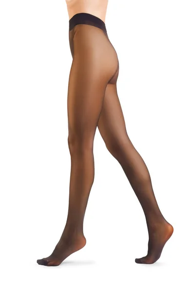 Jambes de femme parfaite en collants isolés sur blanc — Photo