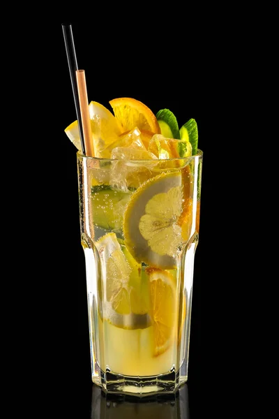 Glass of raspberry, kiwi and lemon ice lemonade isolated on black background — Stock Photo, Image