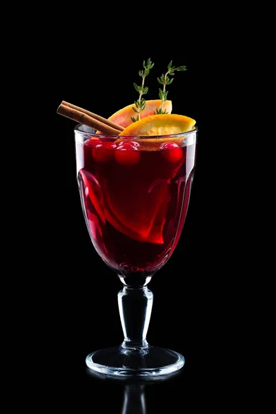 Glass of hot mulled wine isolated on black — Stock Photo, Image