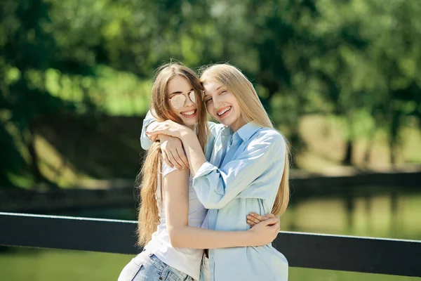 Two Beautiful Young Women Hugging Each Other — Stock Photo, Image